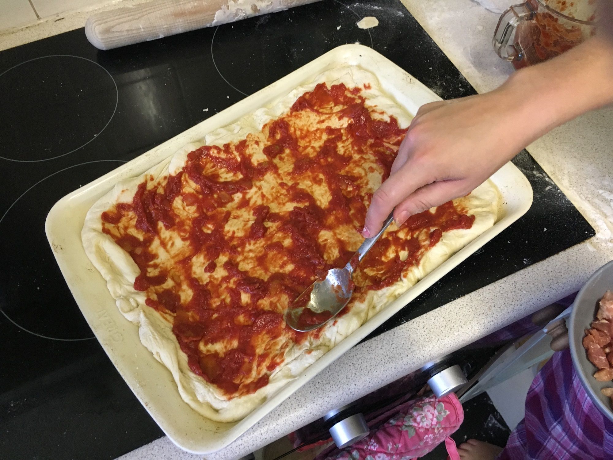 Spreading the Pizza Base
