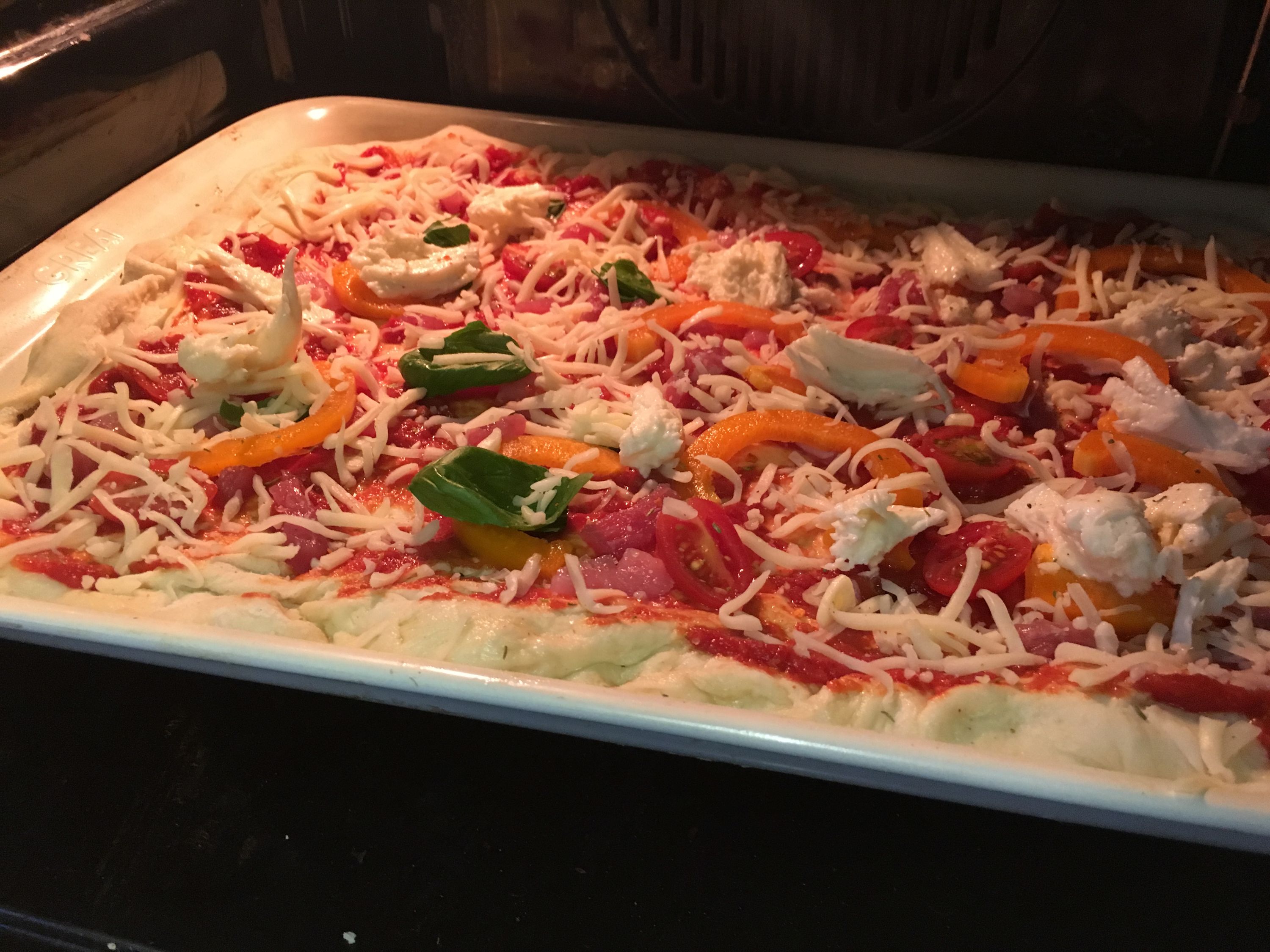 Cooking our Homemade Pizza